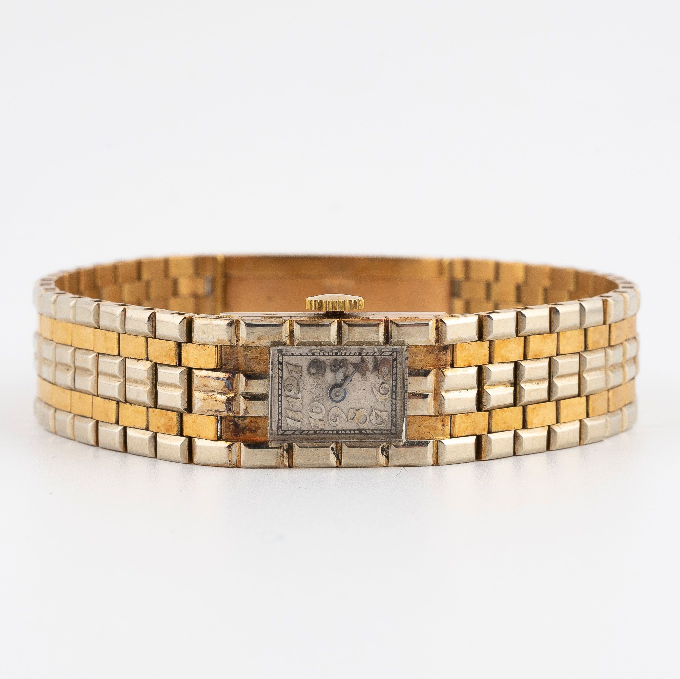 Montre de dame, Or jaune et acier (vers1920)