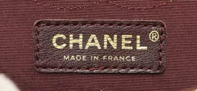 &Eacute;tiquette cousue par la maison &agrave; l'int&eacute;rieur du sac
