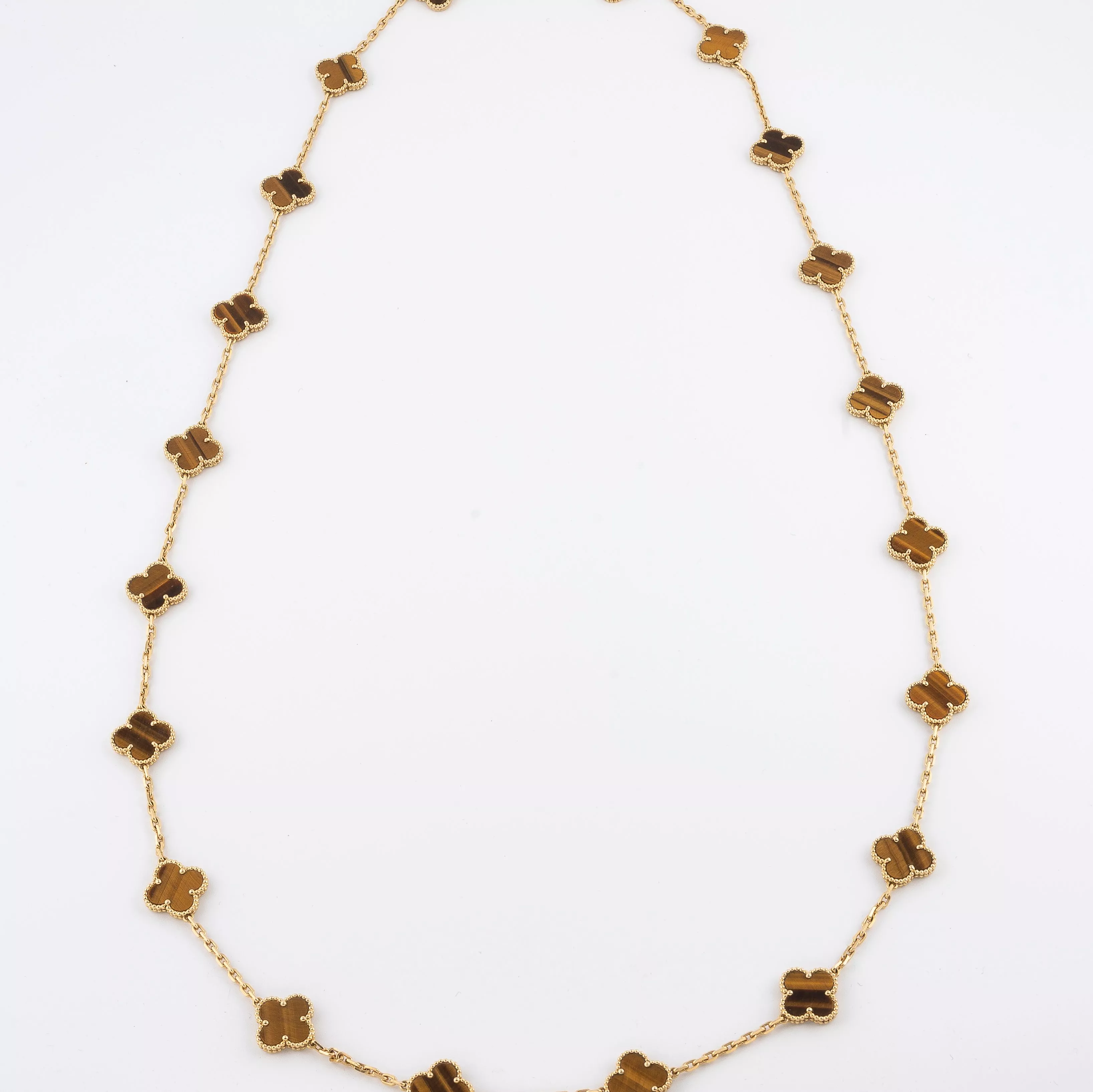 Van Cleef & Arpels, sautoir Alhabama en or jaune et oeil de tigre