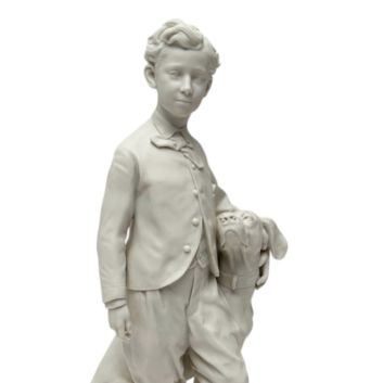 SÈVRES Statuette en biscuit de porcelaine figurant le Prince Impérial et son chien Néro, d’après l’original réalisé en 1865 par Jean-Baptiste Carpeaux