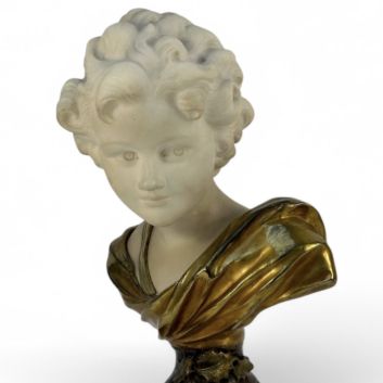 Agathon LÉONARD (1841-1923) Buste de Cupidon Marbre et bronze patiné