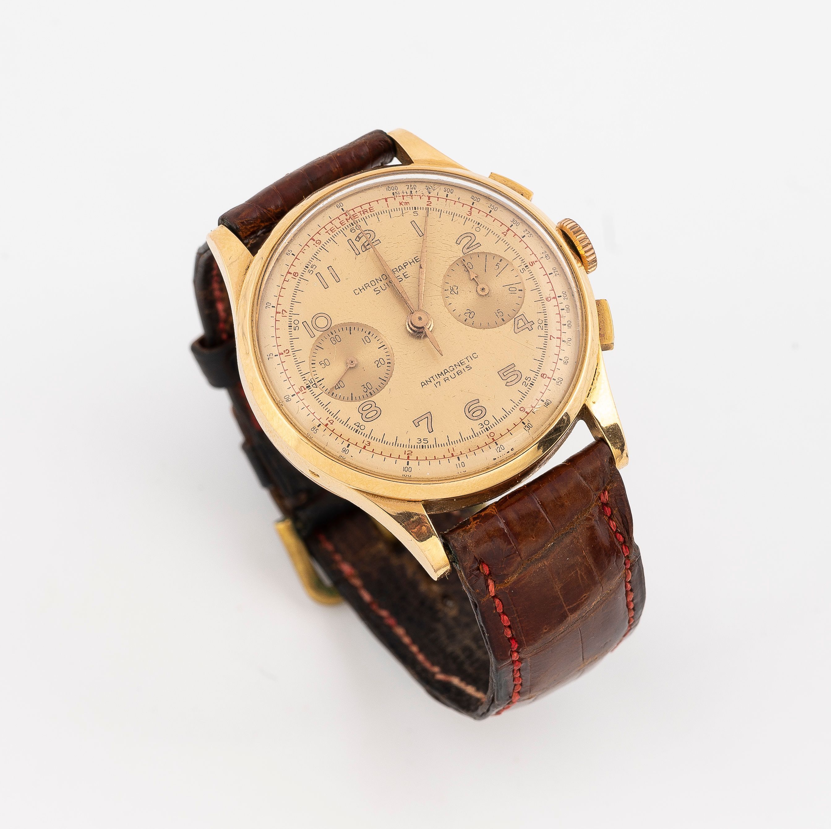 Chronographe Suisse, Montre homme en or jaune (vers 1950)