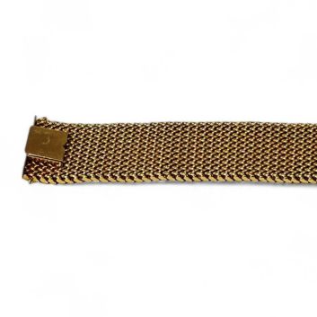 Bracelet manchette en or jaune (750) en tressage de mailles