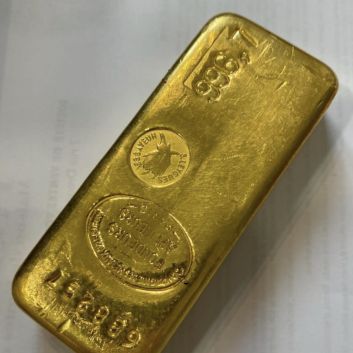Lingot en or (996.7), numéroté 688257 Poids brut 1kg.