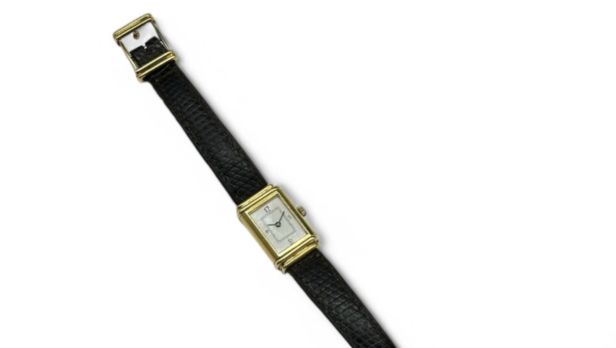 YVES SAINT-LAURENT Montre-bracelet à boitier basculant en or 18K (750 millièmes)