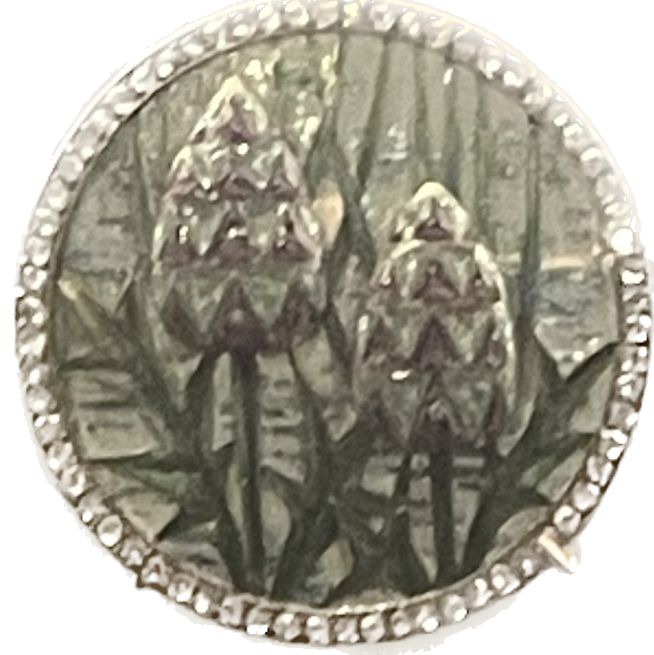 Broche Art Nouveau en or blanc et émeraudes