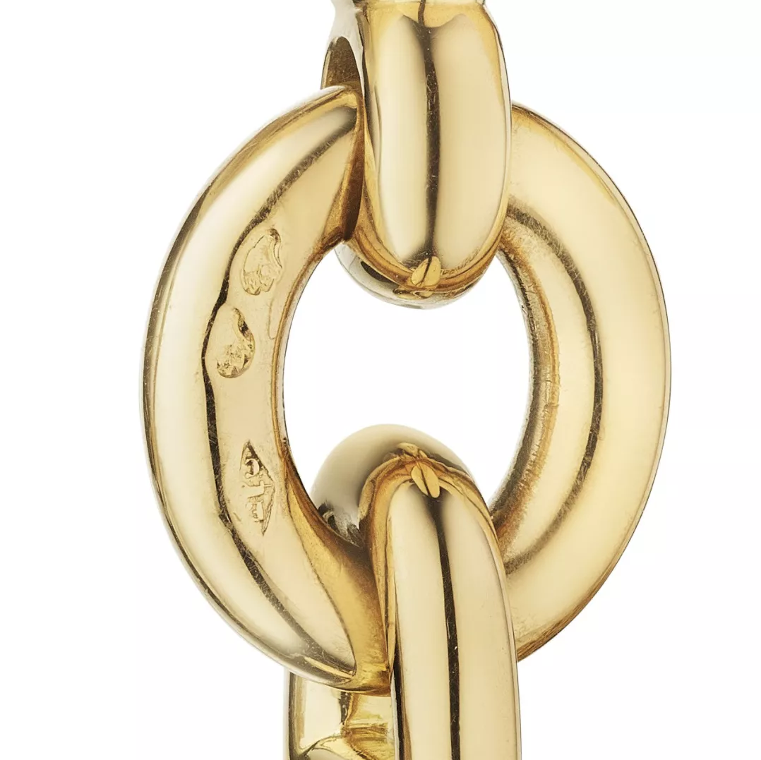 Poin&ccedil;ons appos&eacute;s sur un bracelet en or Herm&egrave;s
