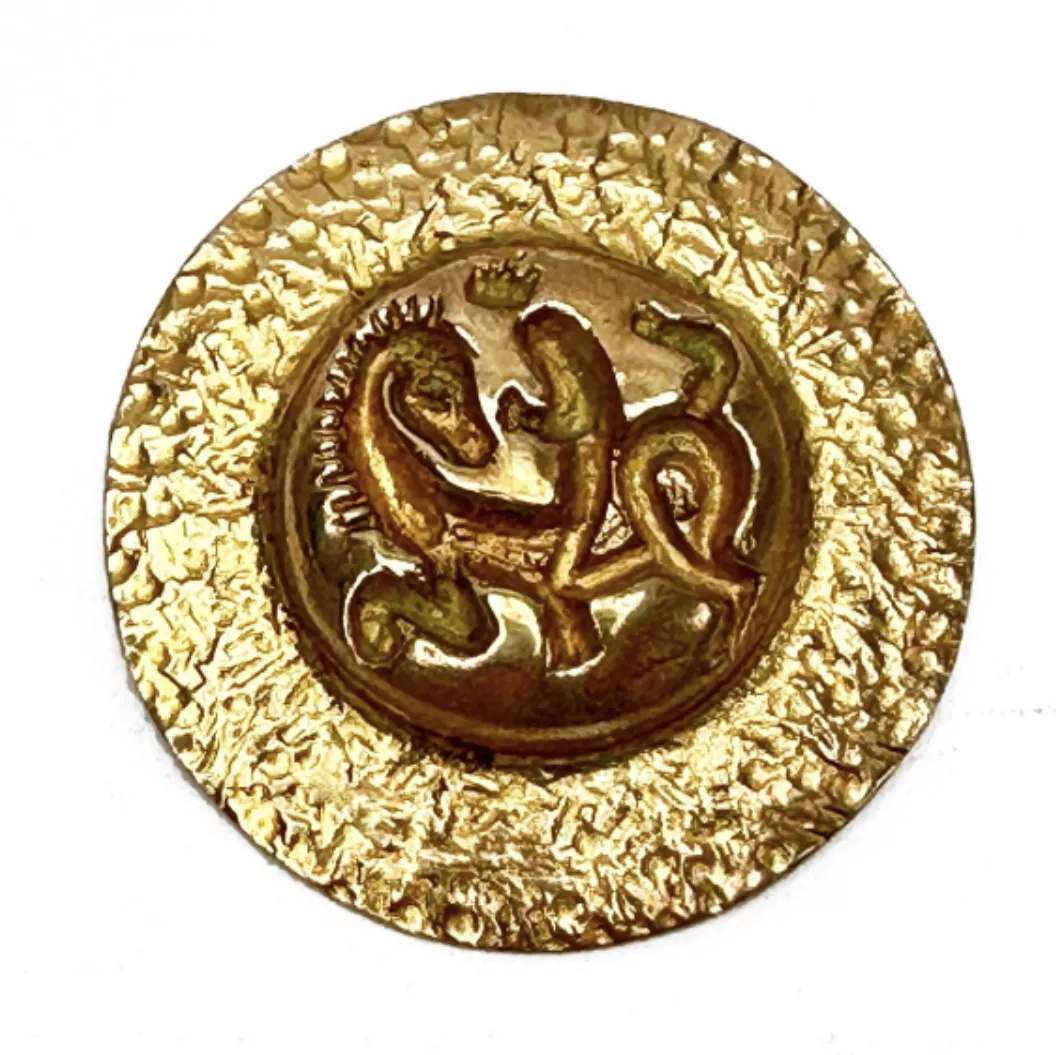 Line Vautrin, broche en bronze dor&eacute;